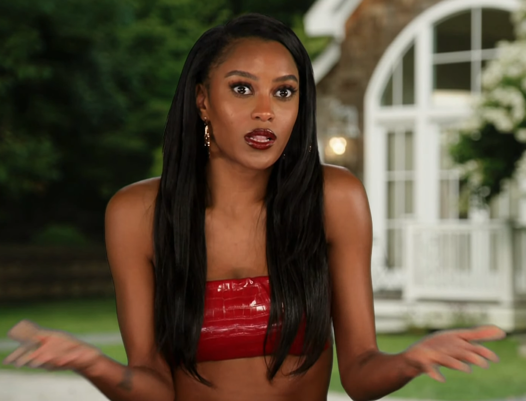 Ciara Miller's Red Leather Croc Confessional Crop Top and Lip Color