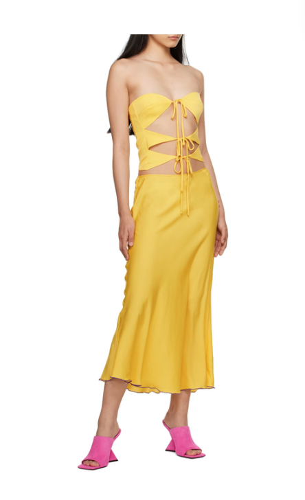 Ciara Miller's Yellow Cutout Tie Front Top and Skirt