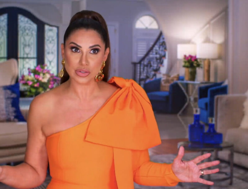 Jennifer Aydin's Orange Bow Shoulder Confessional Dress