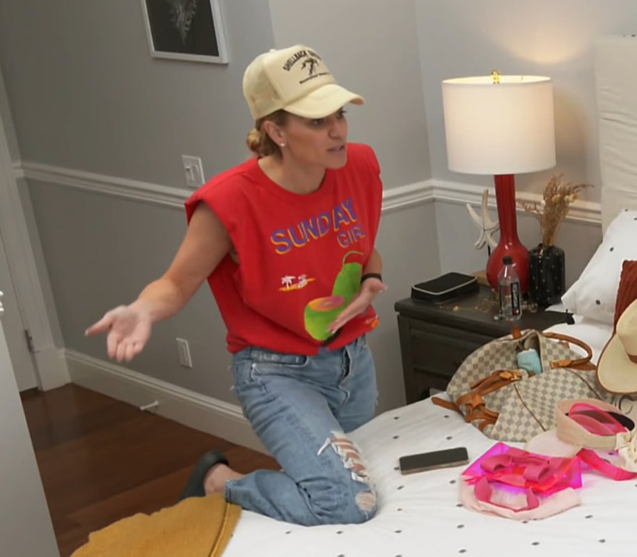 Lindsay Hubbard's Red Padded Shoulder Graphic Top